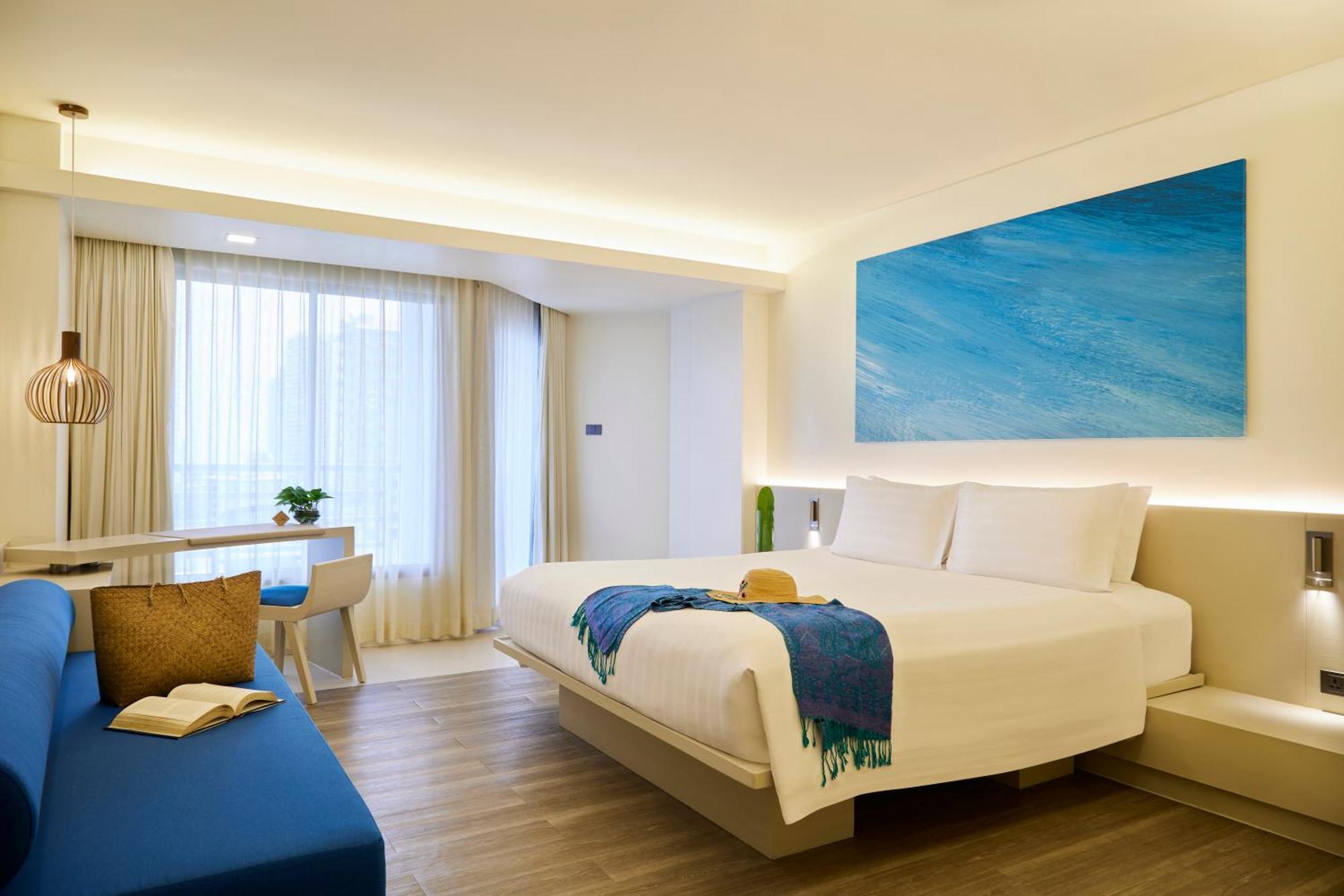 Pullman Pattaya Hotel G Kültér fotó Deluxe Ocean View